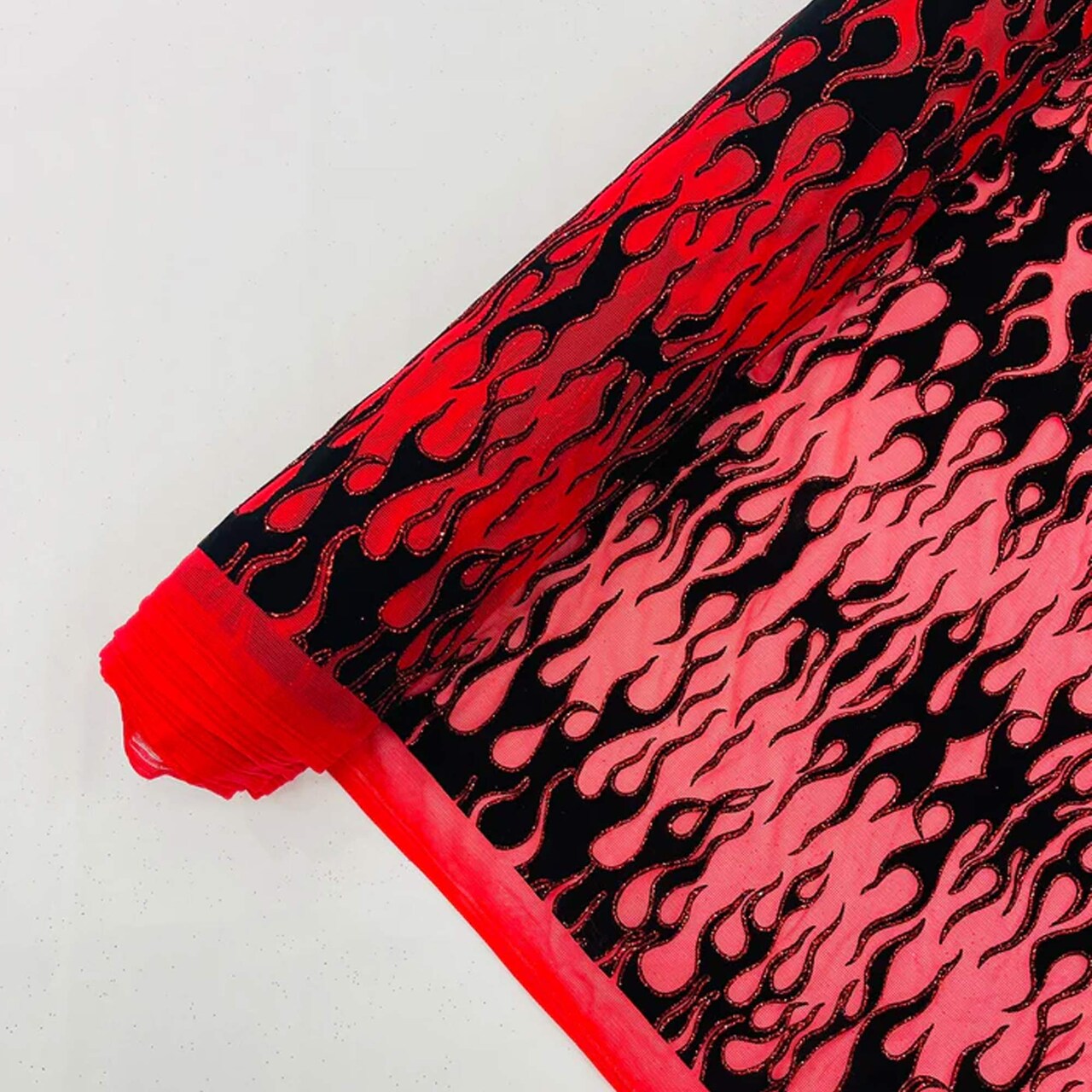 1 Yard Power Mesh Fabric with Black Flocked Flame and Red Glitter Design 60 Inch Width